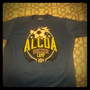 A dark blue soccer camp t-shirt